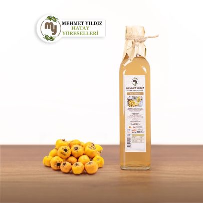 500 ml cam şişede doğal fermantasyonla üretilmiş alıç sirkesi.